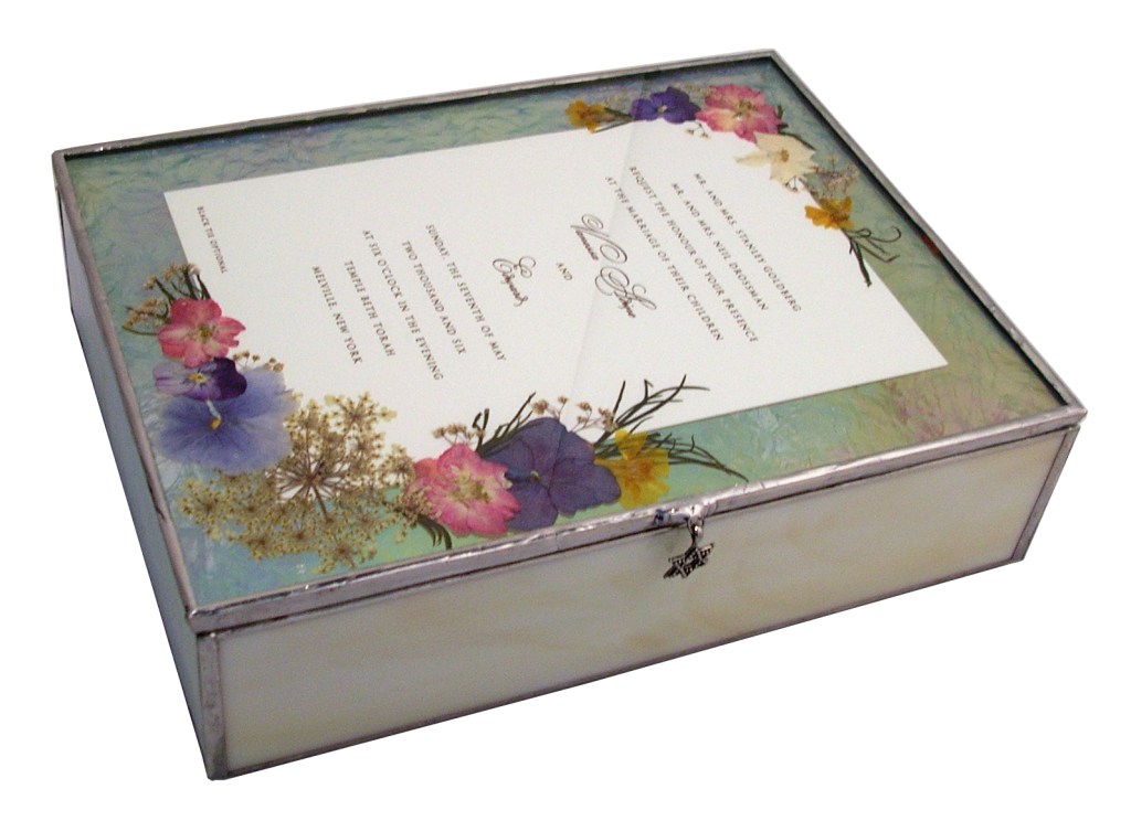 pressed flowers on wedding invitation box